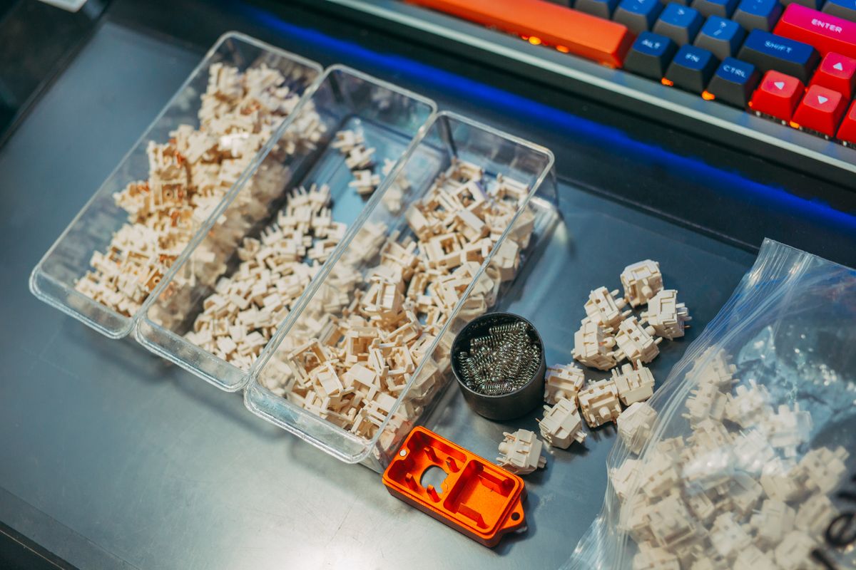 Magnetic keyboard switches laid out on a desk