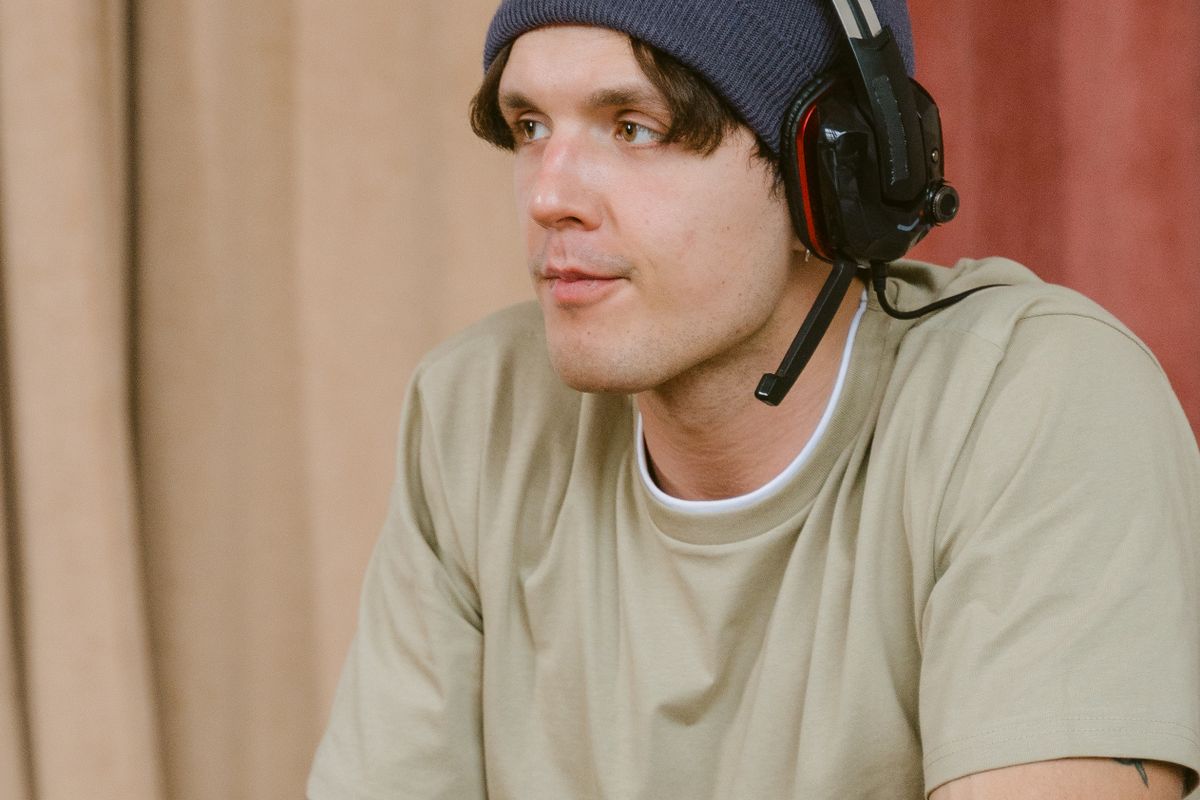 An open-back headphone showing its vented earcup