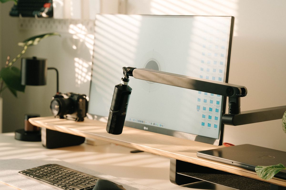A metal desk with cable management channels