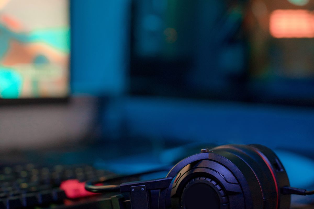 A premium gaming headset with its base station